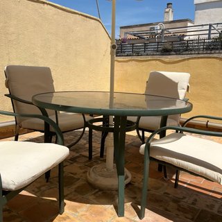 Mesa terraza cristal y 4 sillas metal