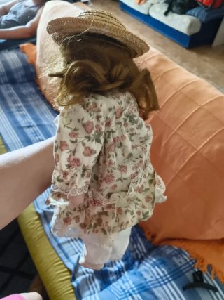 Vecchie bambole in porcellana