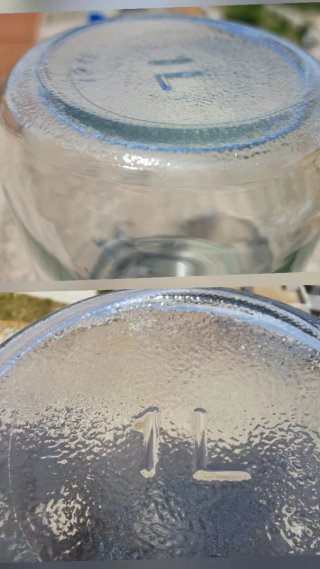 Tarro de cristal antiguo con cierre metal