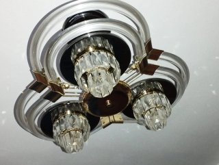 Lámpara salón de cristal y acero en tonos dorados