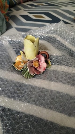 Vela de cerámica decorativa flores