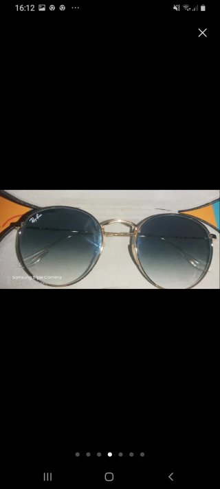 Gafas de sol Ray-Ban doradas y verdes