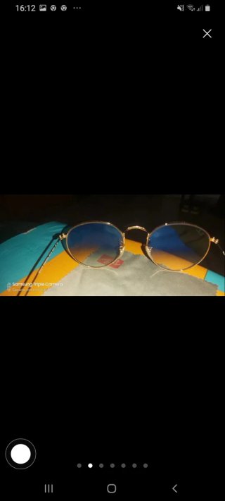 Gafas de sol Ray-Ban doradas y verdes