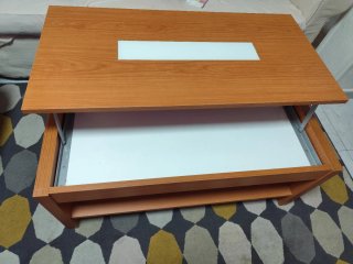 Mesa de centro elevable madera y cristal.