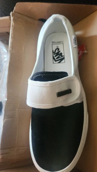 Zapatillas Vans Slip-On Negras y Blancas
