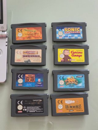Nintendo Game Boy Advance SP + giochi Pokémon...