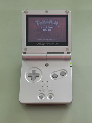 Nintendo Game Boy Advance SP + giochi Pokémon...