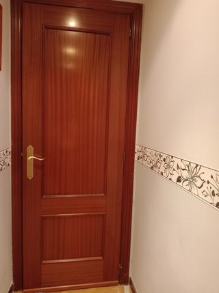 Puerta interior madera acabado roble