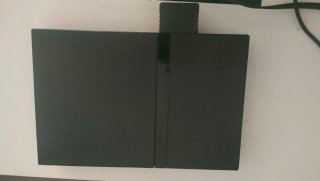 Consola PlayStation 2 + 2 Juegos Buzz
