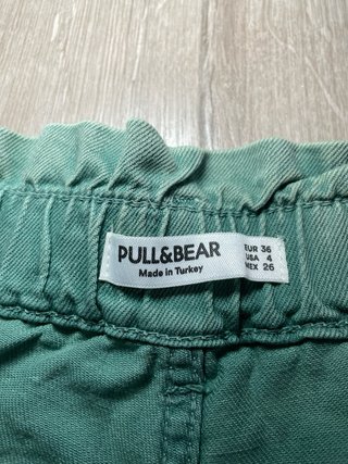 Pantalón vaquero verde desgastado