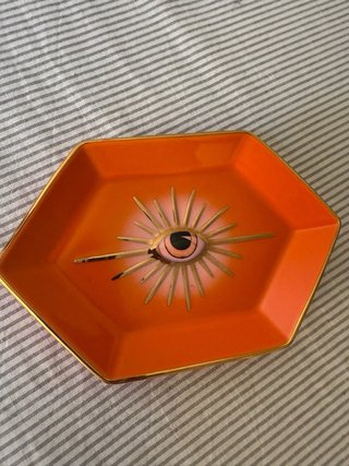 Cerámica ojo porta joyas naranja y dorado