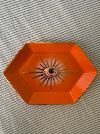 Cerámica ojo porta joyas naranja y dorado