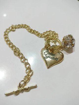 Pulsera Guess Corazón y Estrella Dorada