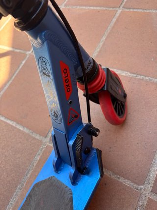Patinete Oxelo azul para niños.
