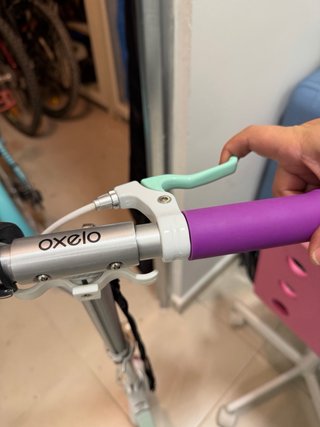 Patinete infantil morado, verde  y blanco