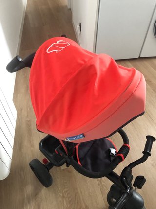 Triciclo para bebé con capota