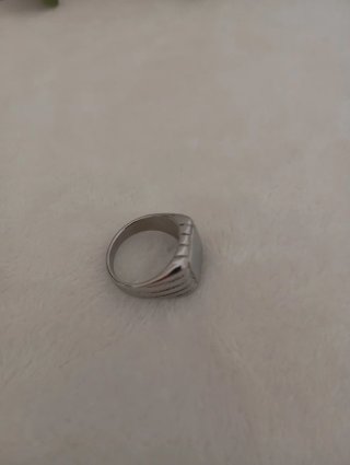 Anillo de hombre plateado