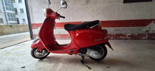 Vespa LX 125 3V (2013) · 6.449 km · Impecable