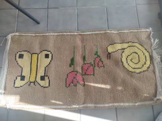 Alfombra artesanal de lana.