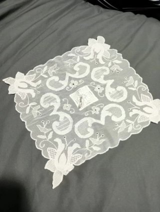 Pañuelo de encaje blanco hecho a mano