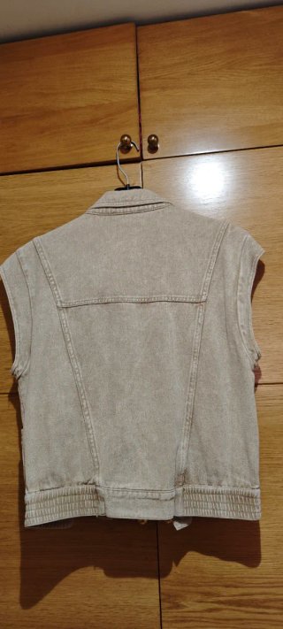 Chaleco vaquero beige sin mangas