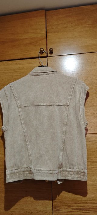Chaleco vaquero beige sin mangas