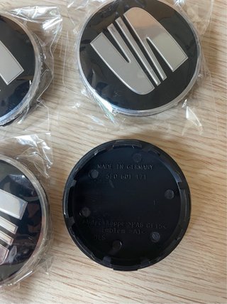 4 Tapabujes Seat 56mm NegroPlata Originales Nuevos