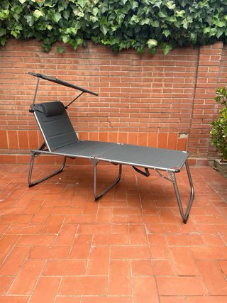 Tumbona plegable con parasol