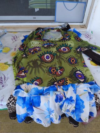 Completo gonna e coprispalle fantasia leopardata