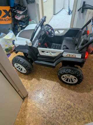 Coche eléctrico 4x4 para niños