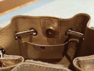 Bolso bombonera piel dorado