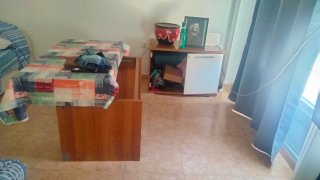 Muebles salón y sofá.