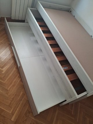 Cama nido con canapés.