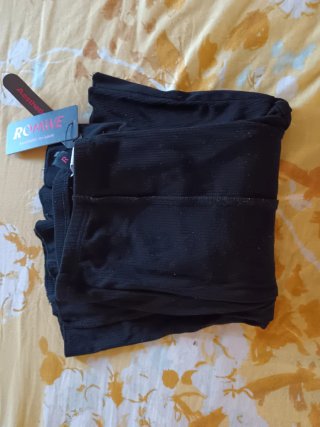 Pantaloni a zampa neri nuovo