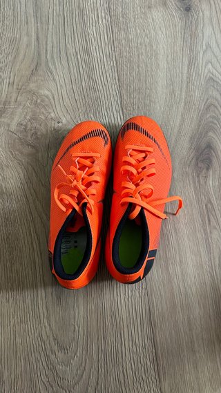 Nike Mercurial Vapor 12 Club MG Naranja y Negro