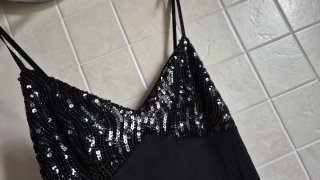 Top donna nero con paillettes e stampa floreale