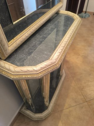 Entradita de vivienda madera, metal y cristal