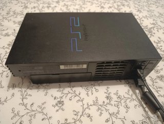Pack PlayStation 2 con Mando y Tarjeta Memoria.