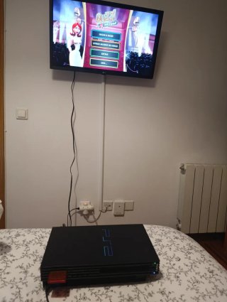 Pack PlayStation 2 con Mando y Tarjeta Memoria.