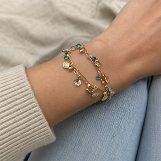 Pulsera Dorada con Conchas y Cristales Azules
