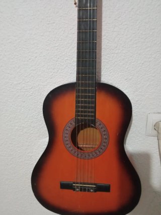 Guitarra acústica casi nueva