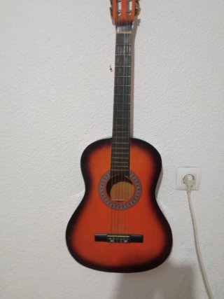 Guitarra acústica casi nueva