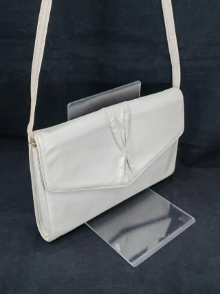Pochette anni '80 grigio/bianco