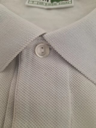 Polo Lacoste manga larga blanco