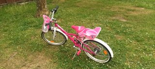 Bicicleta niña rosa con asiento trasero