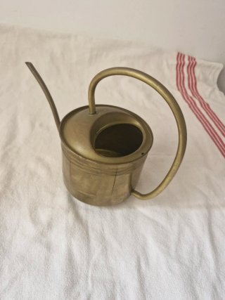 Regadera de latón