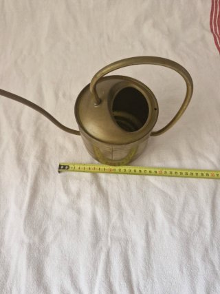 Regadera de latón