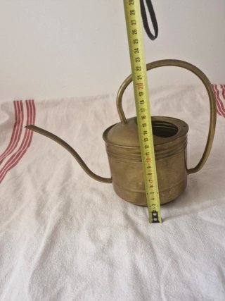 Regadera de latón