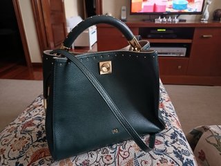 Bolso Purificación Garcia verde y dorado