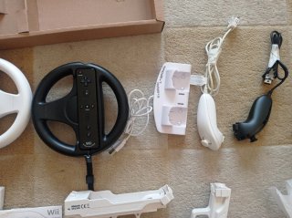 Nintendo Wii Consola, 9 Accesorios con 2 juegos